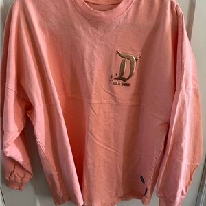 Disney Spirit Jersey Coral Glitter Pink Long Sleeve Pullover with Gold 'D' Logo